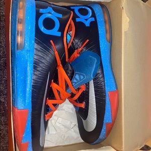 KD red and blue sneakers
